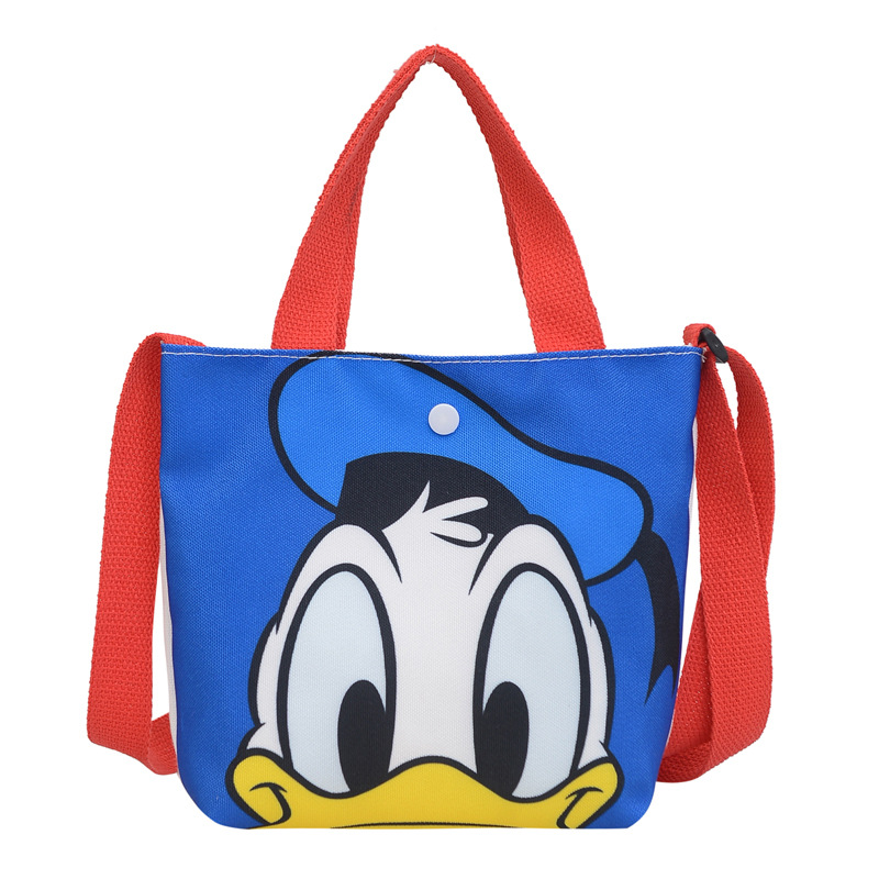 2023 Trendy and fashionable children's canvas cartoon printed crossbody bag, Korean version cute single-shoulder hand-held girls' coin purse Item Picture