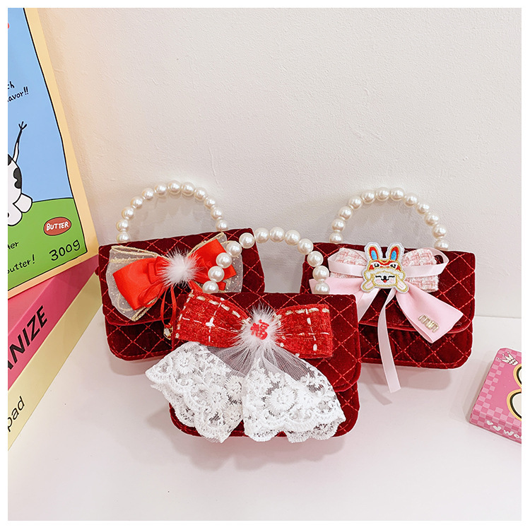 Small and cute girl's handbag, fun and fashionable bow children's bag, Korean-style pearl hand-held crossbody bag for women full figure
