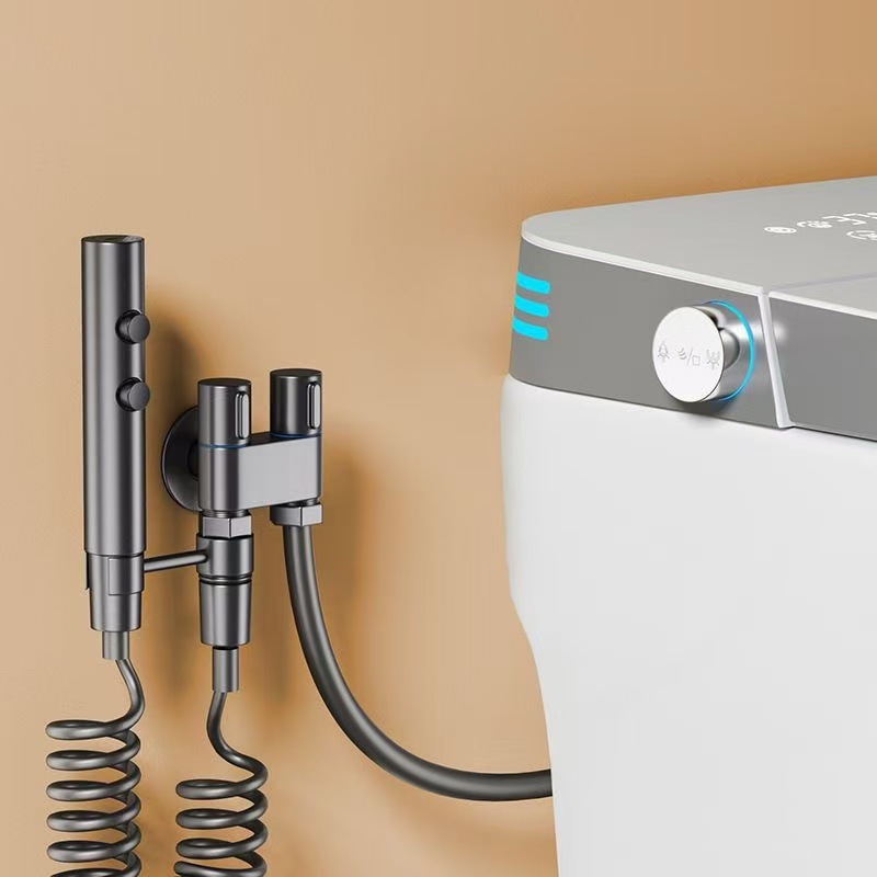 The toilet companion for export comes with a spray gun flushing valve, one inlet and two outlets, a faucet Angle valve, and a high-pressure booster water gun Specification drawing