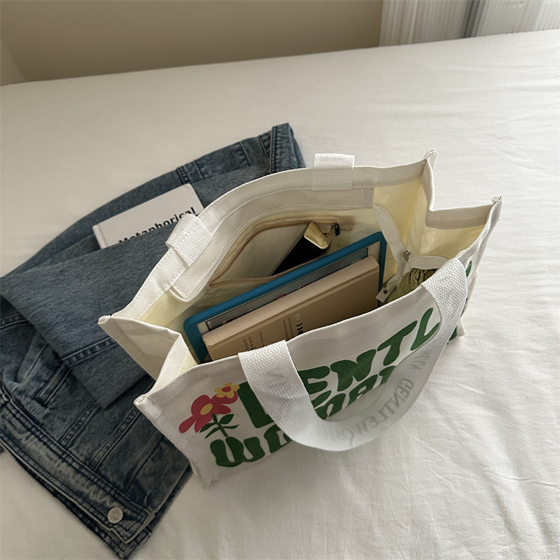 Large-capacity letter canvas bag 2025 new style ins printed versatile shoulder bag for commuting and portable ladies' tote bag Application Scenario