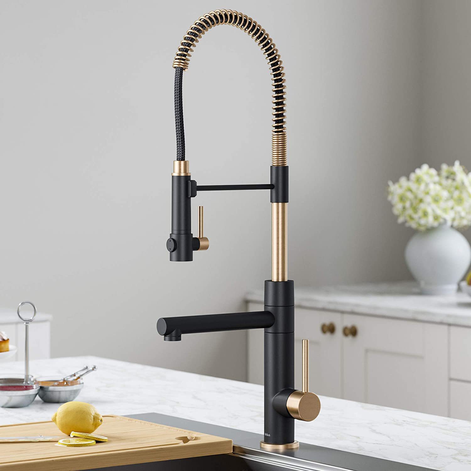The contemporary all-copper cold and hot single handle island kitchen from Germany features a magnetic sink for washing vegetables, a pull-out flower shower, and a rotatable faucet full figure
