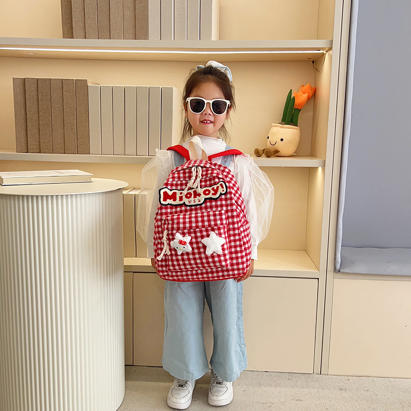 The large-capacity red woolen checkered backpack for primary and secondary school students is a unique and versatile choice. It's a trend for girls to carry backpacks during their leisure trips details Picture