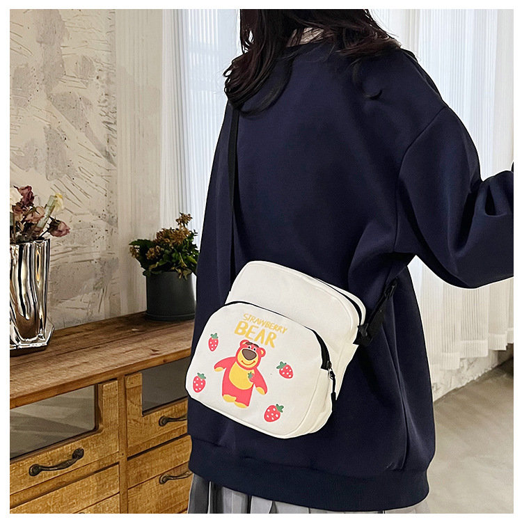 A versatile crossbody bag for girls in 2024, a Korean-style versatile canvas single-shoulder bag, and a Japanese-style cartoon disco bag full figure