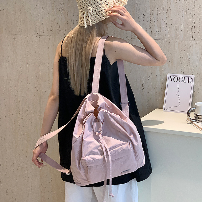 Colorful Fox Korean solid color simple and fresh student backpack, large-capacity ultra-light drawstring women's bag full figure