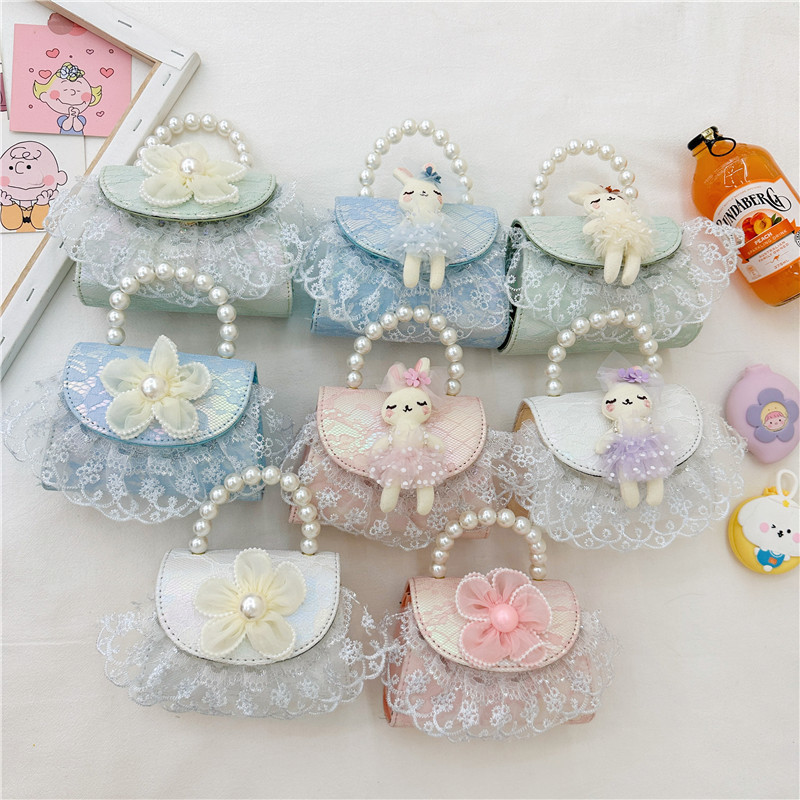 Fashionable girl pearl hand-held princess bag, cute children's bag, crossbody bag, texture casual change accessory bag full figure