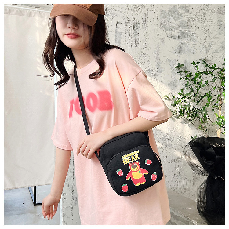 A versatile crossbody bag for girls in 2024, a Korean-style versatile canvas single-shoulder bag, and a Japanese-style cartoon disco bag details Picture