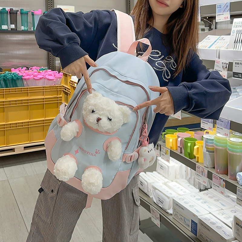 Cute little bear backpack for girls, high appearance level, schoolbag for junior and senior high school students, cartoon doll schoolbag for girls full figure