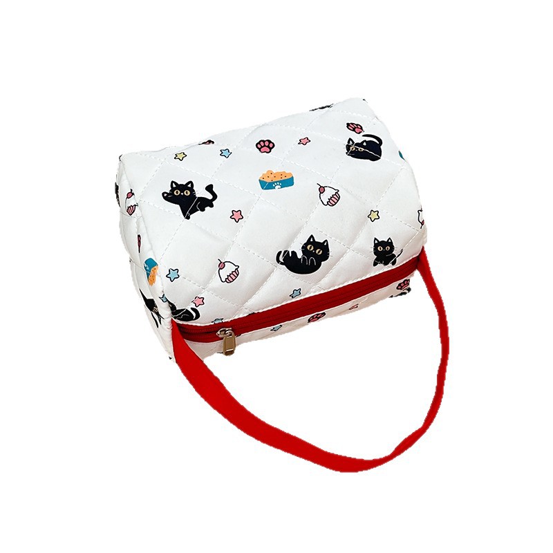 Japanese-style cartoon cat makeup bag with high appearance standards, a three-dimensional large-capacity travel storage bag for girls to wash up when going out, a trendy hand Item Picture
