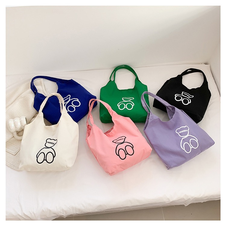 New Japanese-style cute canvas bag for students, large-capacity single-shoulder bag, a niche and versatile hand-held cloth bag for women, wholesale details Picture