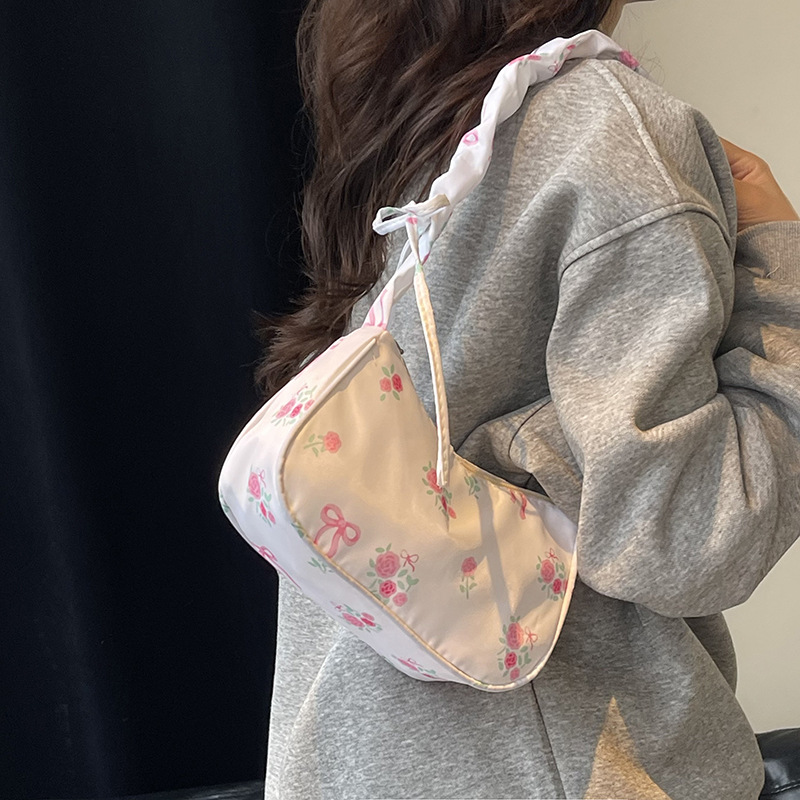 Korean sweet underarm bag for women 2025 new style bow floral handbag, niche drawstring versatile shoulder bag Application Scenario