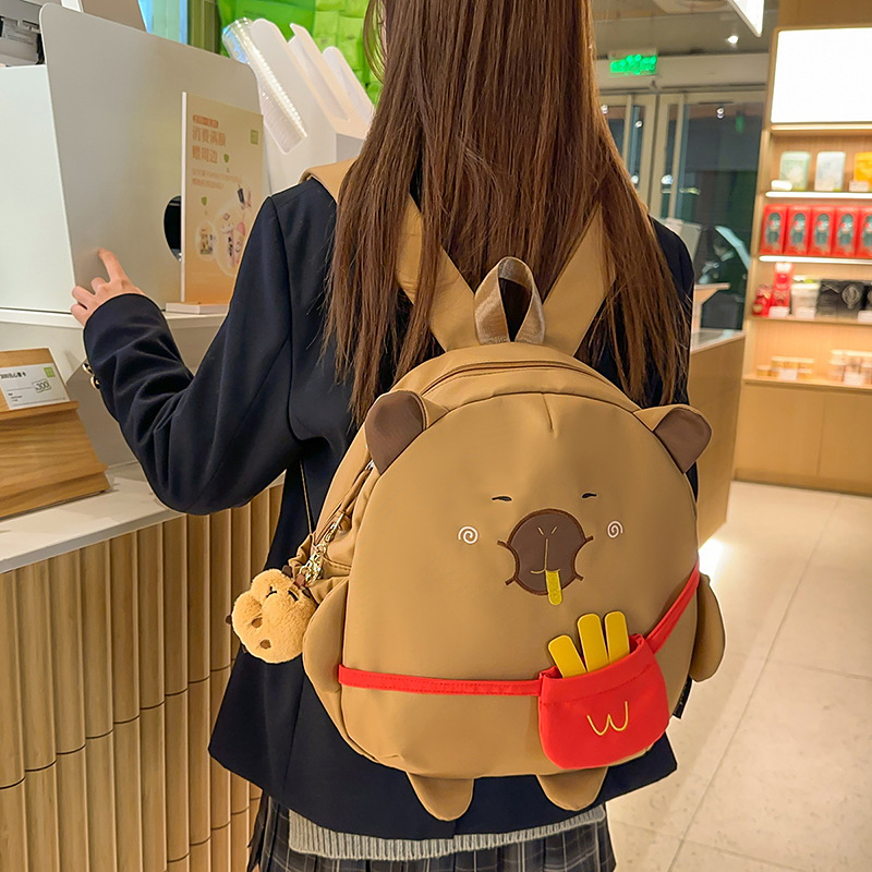 Fun and cute French fries Capibara backpack for girls and students, large-capacity cartoon water guinea pig children's schoolbag full figure