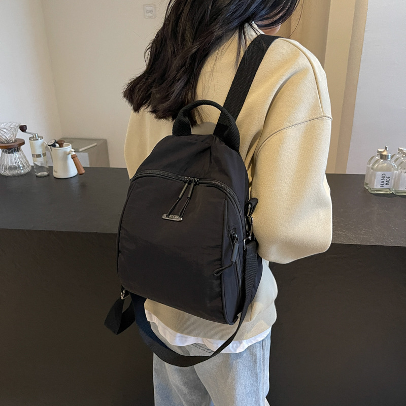 The 2024 new style of personalized, fashionable and versatile schoolbag for daily use, a large-capacity travel backpack, is selling well across borders details Picture