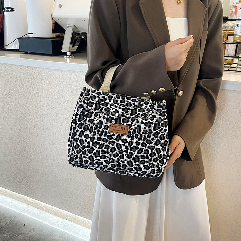 Wholesale of cross-border large-capacity canvas bags, single-sided printed handbags, commuter tote bags, art student bags, single-shoulder bags details Picture