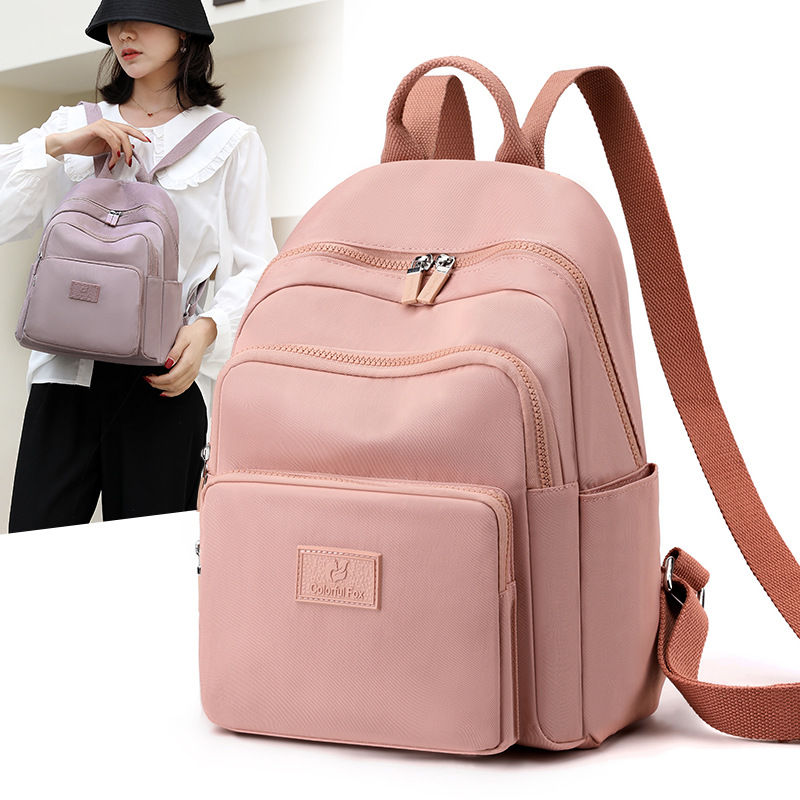 Colorful Fox's new backpack, a large-capacity casual backpack for women, is water-resistant and multi-layered for travel students full figure