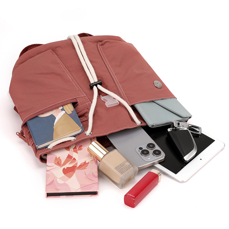 Colorful Fox's new Korean-style ins women's niche design lightweight pocket button drawstring backpack Application Scenario