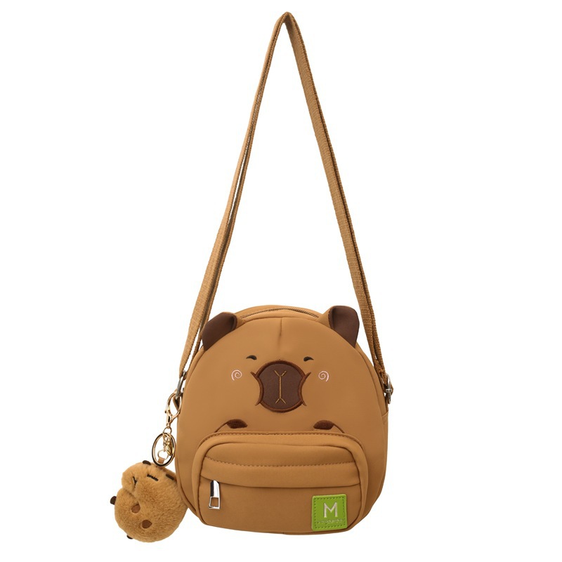 Children's Capibara crossbody bag, little girl's light and fashionable single-shoulder bag for travel, boy's cute capybara mini backpack Item Picture