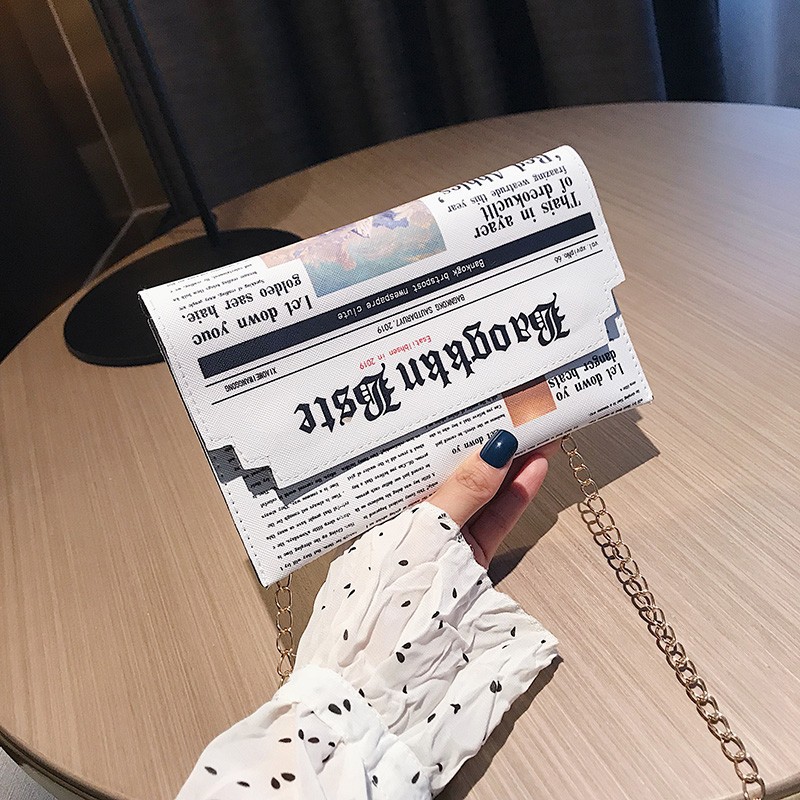 The 2022 new trendy Korean-style personalized newspaper fashion iron chain single-shoulder small square bag and retro casual crossbody bag by Bag Girl full figure