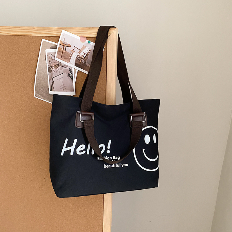 Wholesale of 2024 new Korean-style casual student canvas bags with a large capacity and smiling face Application Scenario