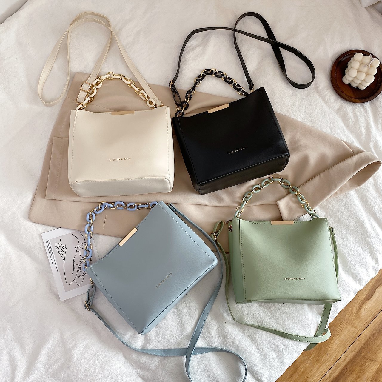 The 2022 new Korean-style women's bucket bag is a trendy spring and summer single-shoulder crossbody bag for young women. It's a cute and simple commuting bag for women full figure