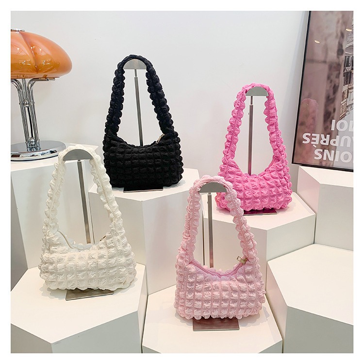 The 2024 new cute bubble single-shoulder bag for trendy women, the Korean-style simple underarm bag, and the versatile hand-held dumpling bag full figure