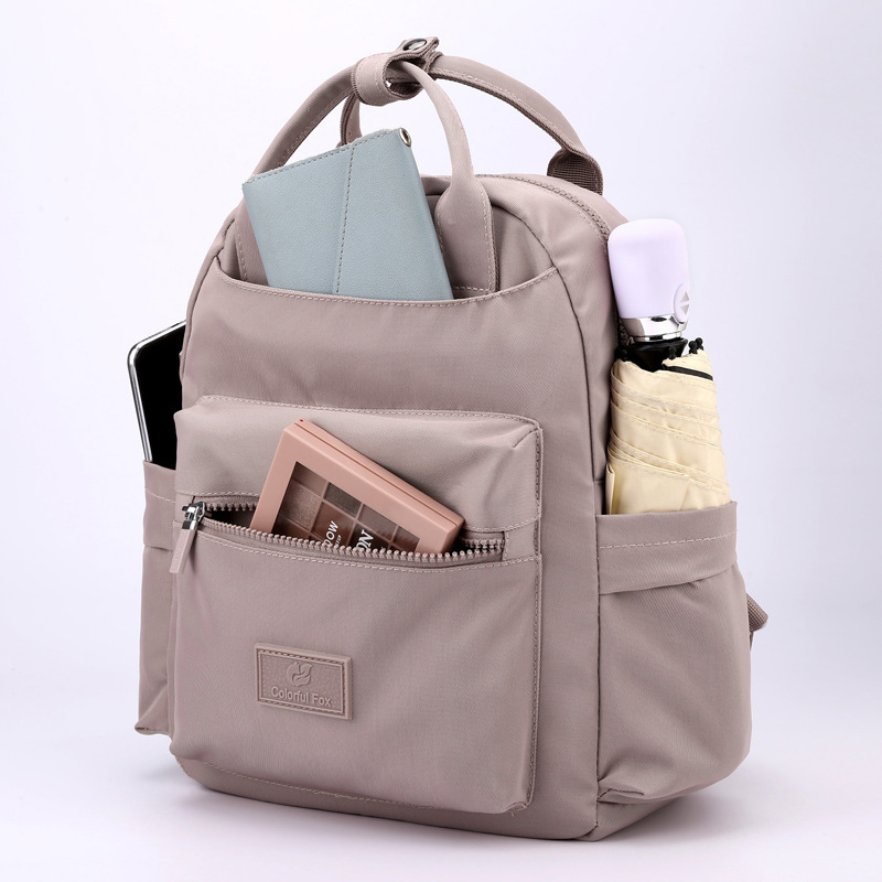 Colorful Fox's new backpack, multi-functional candy-colored backpack, large-capacity water-resistant schoolbag and handbag Application Scenario