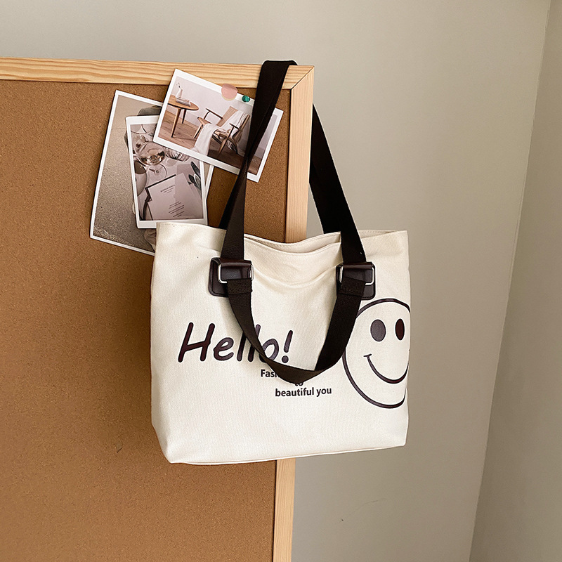Wholesale of 2024 new Korean-style casual student canvas bags with a large capacity and smiling face details Picture