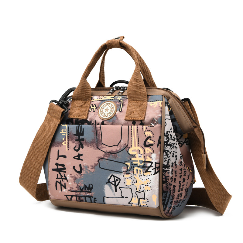 Mom's portable baby bag for going out, multi-functional and fashionable mommy bag, hand-held shoulder crossbody bag, water-resistant for pregnant women Item Picture