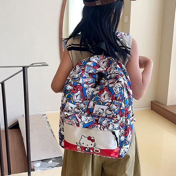 New campus cute kt niche versatile schoolbag with printed graffiti, a lightweight and large-capacity backpack for girls Application Scenario