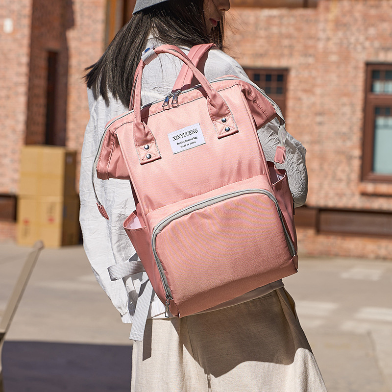 New lightweight Mom Bag for baby and mother outings, large-capacity backpack, fashionable and multi-functional hand-held mom milk bag Application Scenario