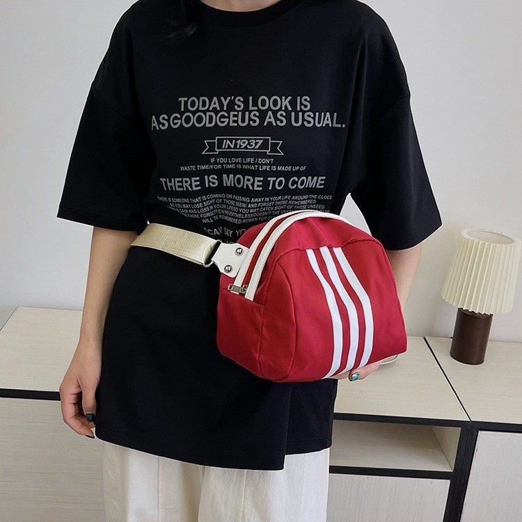 The 2024 new stylish and simple crossbody bag, a large-capacity versatile single-shoulder bag, is popular among students. The three-bar chest bag is selling well Application Scenario