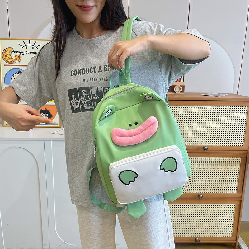 A new large-capacity, creative and funny schoolbag for students in the style of a Japanese-style cute and ugly cartoon anime school full figure
