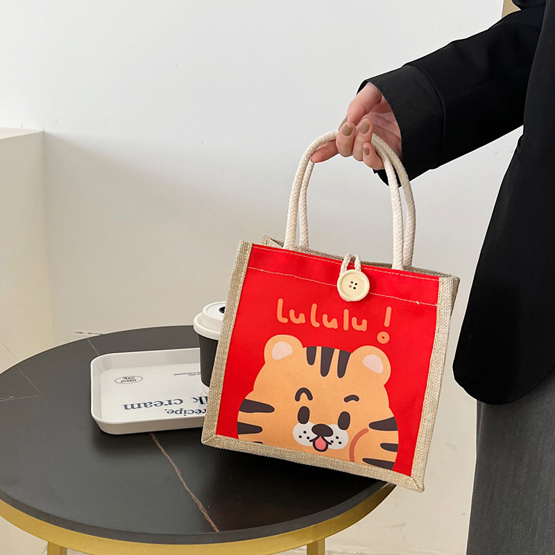 Cute hand-held linen bag 2023 new style women's bag, hand-held bento bag, simple lunch bag for office workers with rice details Picture