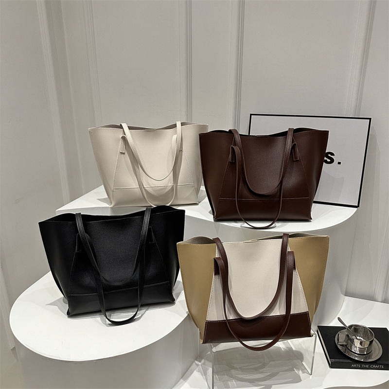 A new minimalist and stylish tote bag with a contrasting color scheme for commuting, a versatile and elegant shoulder bag for women full figure