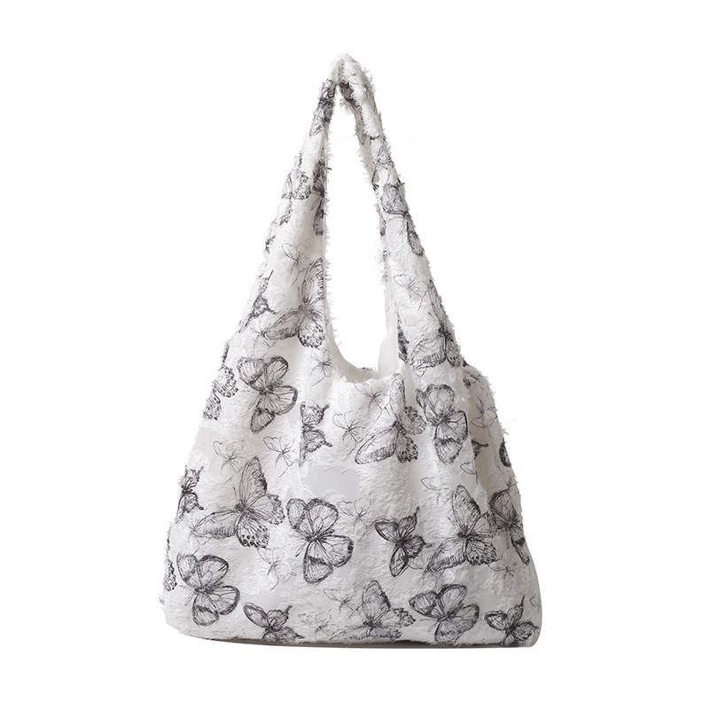 A large-capacity commuting single-shoulder bag for 2024, a super popular summer embroidered large bag for women, a niche tote bag with a sense of design Item Picture