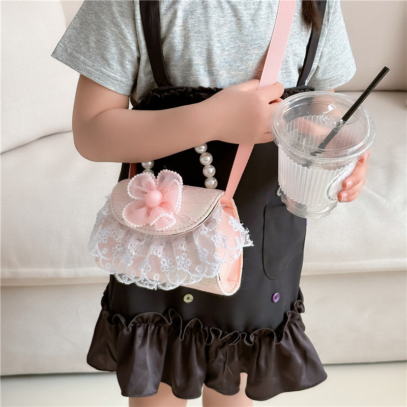 Fashionable girl pearl hand-held princess bag, cute children's bag, crossbody bag, texture casual change accessory bag details Picture