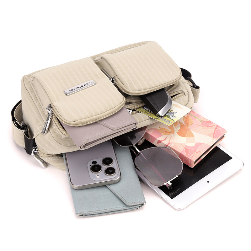 Colorful Fox's original new water-resistant camera bag, crossbody bag, ins striped single-shoulder bag for both men and women Item Picture