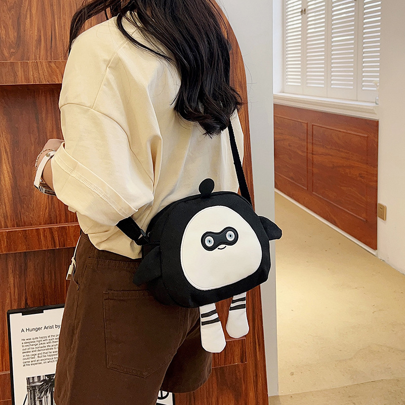 Spring new cute egg doll party bag, cartoon large-capacity canvas crossbody bag, trendy and stylish girls' single-shoulder bag Specification drawing