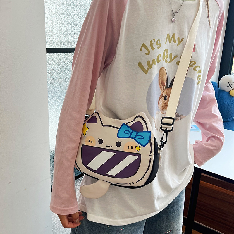 A lightweight and versatile handbag for foreign trade, a cute and individualistic printed student single-shoulder bag, and a large-capacity crossbody tote bag details Picture