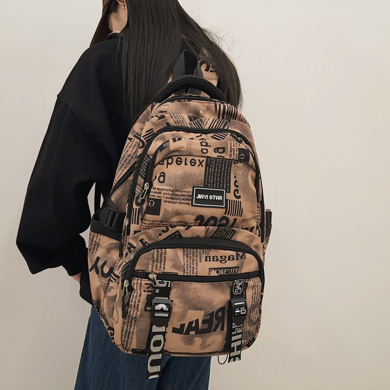 New college student fashionable, durable and large-capacity backpack for junior and senior high school students. High appearance level graffiti camouflage double backpack Specification drawing