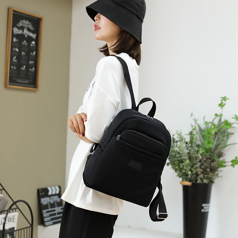 Men's and women's fashionable large-capacity backpacks, campus artistic water-resistant schoolbags, personalized portable travel bags details Picture