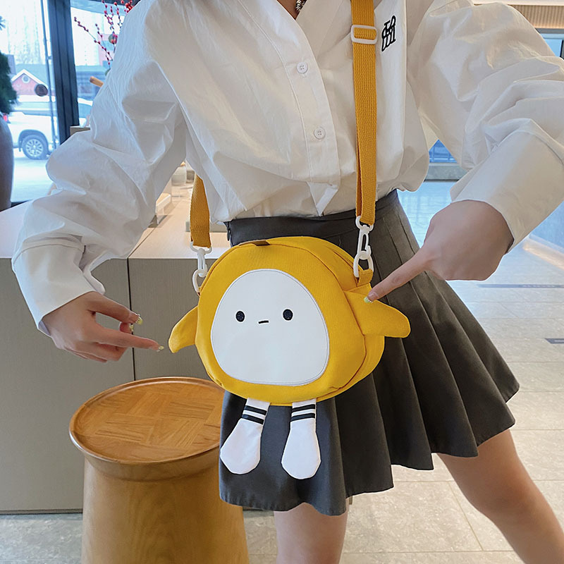 The new 2024 children's egg-shaped party backpack is a cute cartoon canvas single-shoulder bag and a fashionable and stylish small backpack details Picture