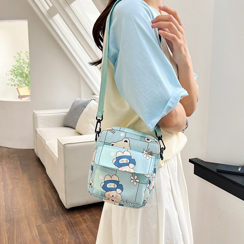Wholesale of new Japanese-style schoolgirl bags, cartoon small square bags for students attending classes, lightweight and compact single-shoulder crossbody bags details Picture