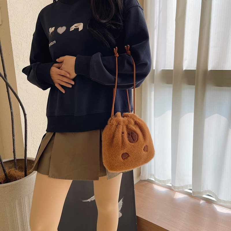 High appearance level Kapibara backpack, plush bag, cartoon drawstring bag, cute capybara storage bag, new crossbody details Picture