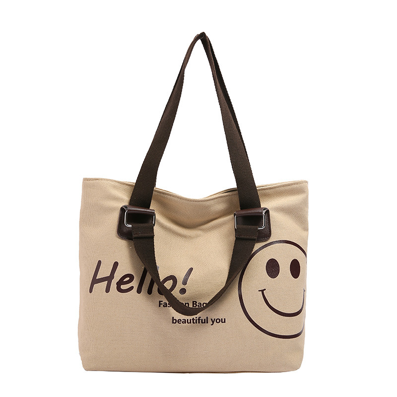 Wholesale of 2024 new Korean-style casual student canvas bags with a large capacity and smiling face Item Picture