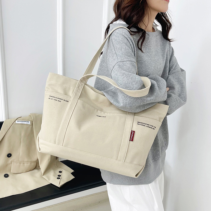 New cross-border versatile single-shoulder tote bag, laid-back style, large-capacity canvas bag, high-end commuter women's bag, handbag details Picture
