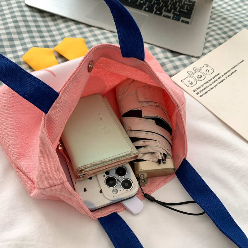The new summer canvas women's bag is cute and fashionable. It's a small square bag, fresh and simple. It's a single-shoulder student bag and a hand-held small bag Application Scenario