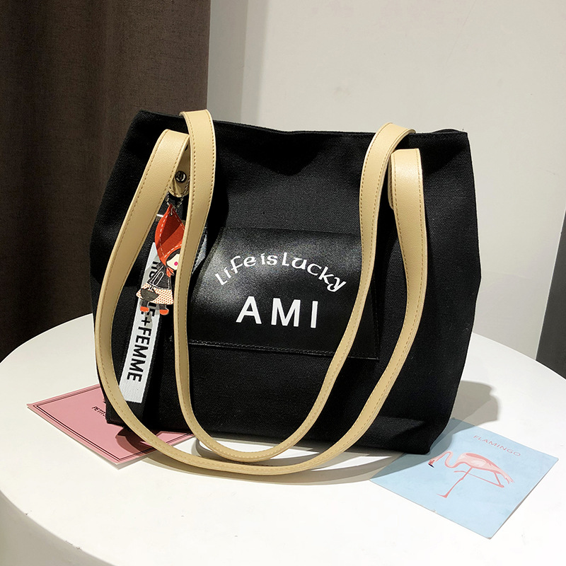 2021 Autumn New Korean-style large-capacity canvas bag, simple and casual hand-held bag, shoulder bag, shopping bag, tote bag for women Application Scenario