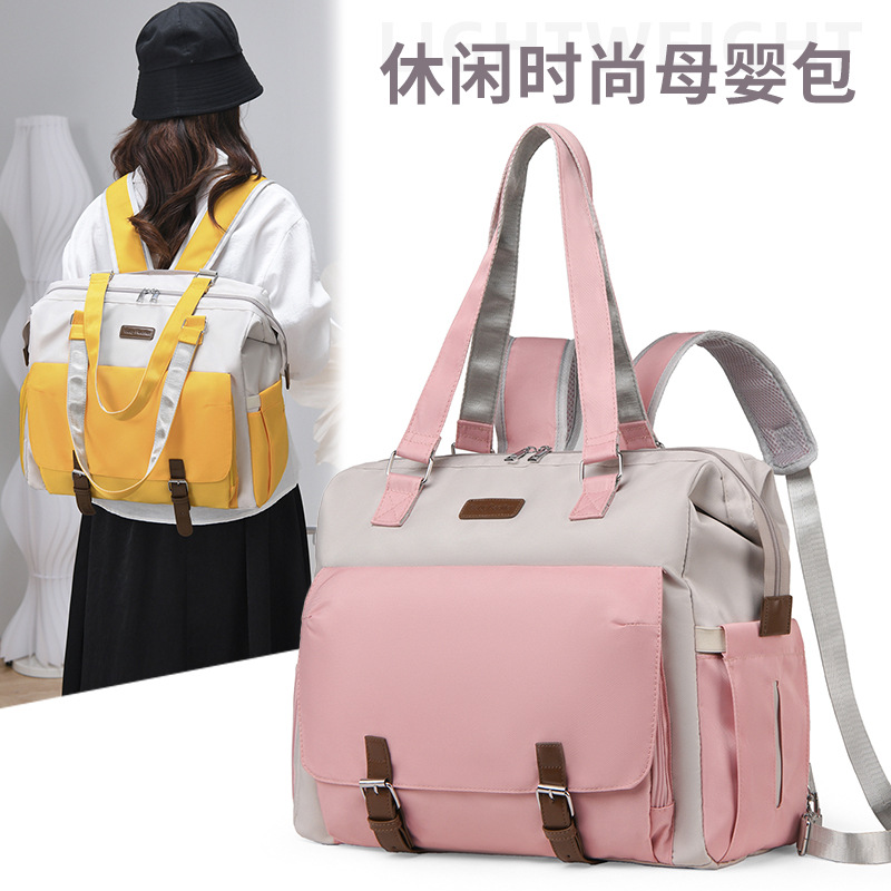 This multi-functional, large-capacity, lightweight hand-held backpack is suitable for both mother and baby bags and pregnant women's shoulder crossbody bags for going out full figure