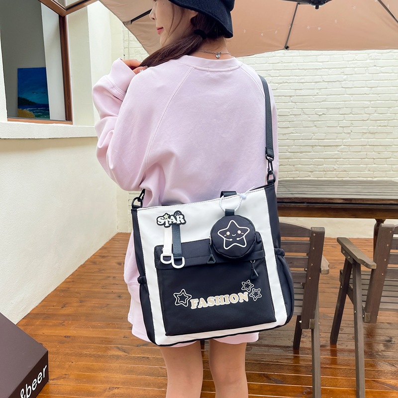 Student single-shoulder bag, Korean version color-blocked letter crossbody bag, hand-held tutorial bag for primary and secondary school students, hanging bag, student bag details Picture
