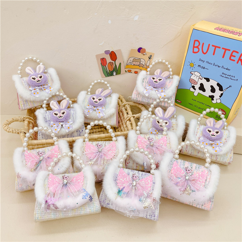 The Korean version of Elsa children's bags, small chanel-style accessories, pearl handbags, and the popular momo single-shoulder crossbody rabbit small bag full figure